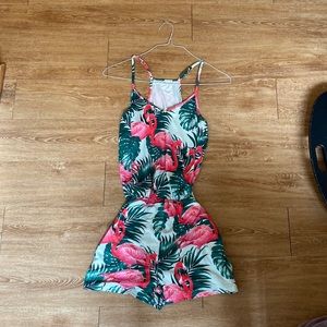 Never worn but no tags super soft romper with pockets and adjustable straps!